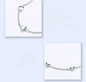 Detailed view of sterling silver heart pendant with high-polished box chain