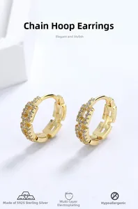 Macro shot of 18k gold plated s925 silver hoop earrings with pavé set cubic zirconia stones