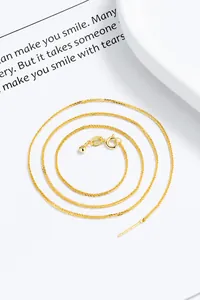 Dettaglio catena regolabile in argento 925 dorato con ago per infilare perline fai-da-te