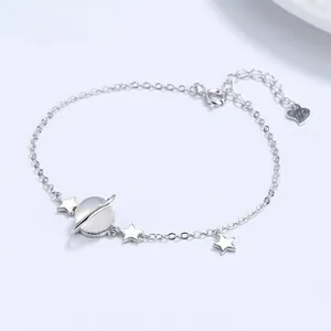 Detailed shot of 925 sterling silver Little Prince bracelet with moon and star charms