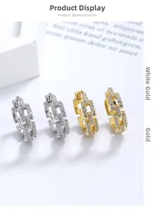 Detail of s925 silver hoop earrings with chain link design and pavé cubic zirconia accents