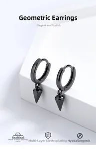 Detailed macro of S925 sterling silver stamp on black geometric cone earring