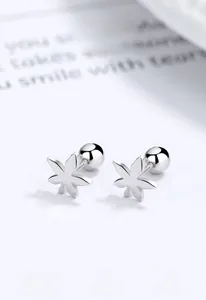 Macro view of S925 sterling silver maple leaf earrings with screw back ball closure