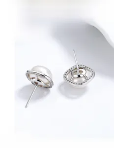 Detailed view of S925 sterling silver freshwater pearl earrings with zircon inlay