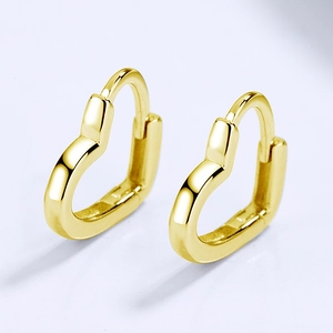 Boucles d'oreilles créoles cœur évidé en argent sterling 925 avec finition dorée