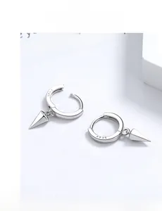 Close-up of S925 sterling silver hoop earrings with a sleek minimalist cone pendant