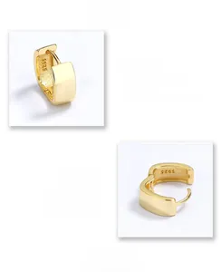 Detail showing S925 hallmark on polished gold square sterling silver hoop earrings