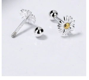 Macro shot of S925 sterling silver daisy stud earrings with screw back security