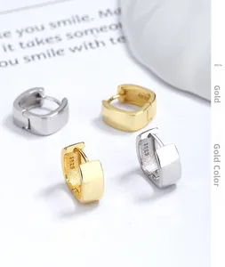 Macro shot of S925 sterling silver stamp on minimalist square hoop earrings set