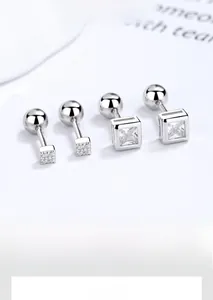Detailed macro view of S925 sterling silver square zircon stud earrings with screw backs