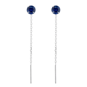 Orecchini a filo in argento 925 con zircone blu e raffinata incastonatura a quattro griffe