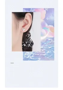 Detailed close-up of 925 sterling silver butterfly earrings with sparkling micro diamonds
