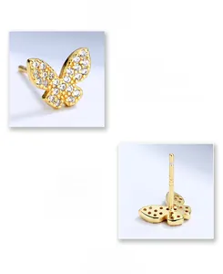 Macro detail of S925 sterling silver butterfly earrings with micro-pave zircon crystals
