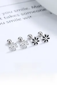 Macro view of S925 sterling silver sunflower stud earrings with screw back closures