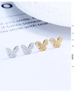 Close-up of 925 silver butterfly earrings with micro-pave cubic zirconia settings