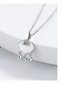 Close-up of a 925 sterling silver Ruyi lock pendant with white mother-of-pearl inlay