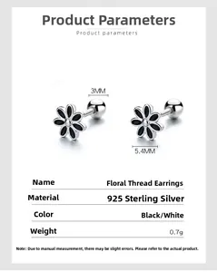 Macro shot of 925 sterling silver sunflower earrings with black enamel and screw back detail