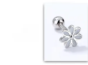Detailed macro view of S925 sterling silver sunflower stud with white enamel flower petals