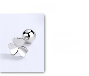 Macro detail of S925 sterling silver clover earrings with secure screw ball back