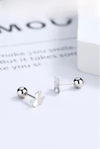 Macro shot of 925 silver clover screw-back earrings with a high-polished finish