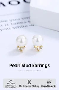Détail de boucles d'oreilles en argent 925 avec perles et éclats de zircone