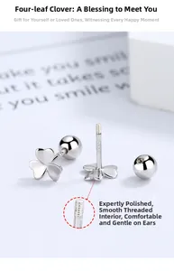 Macro detail of S925 sterling silver stamp on clover stud earrings with screw back design