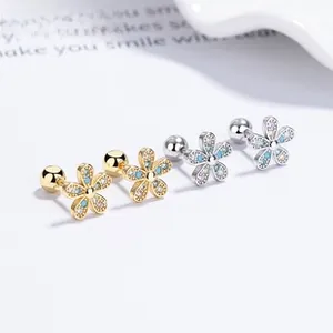 Detail of 925 silver flower stud earrings with marquise stones and screw back closure