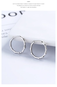 Close-up of 925 sterling silver hoop earrings with a textured bamboo joint design