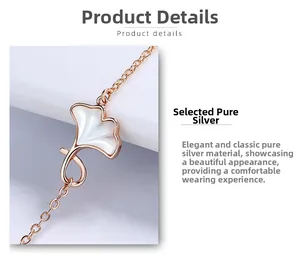 Detailed macro view of 925 silver ginkgo leaf bracelet with white mother of pearl