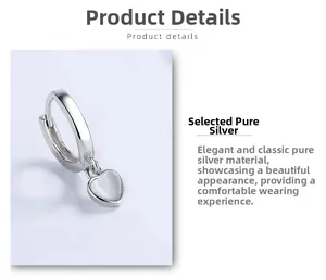 Detailed close-up of S925 sterling silver stamp on heart-shaped pink cat-eye stone earrings