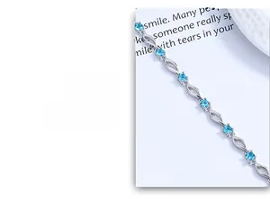 Close-up of S925 sterling silver bracelet with blue crystals and hollow twisted links