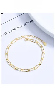 Detail of S925 sterling silver gold-plated bracelet featuring textured rectangular links