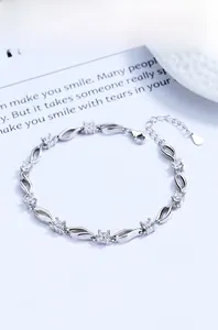 Detailed macro view of S925 silver bracelet featuring eight sparkling round zircons