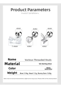 Détails macro de boucles d'oreilles 925 argent avec nœud, cœur et lapin avec dimensions