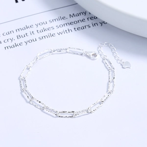 925 sterling silver rectangular link bracelet with textured finish and heart charm