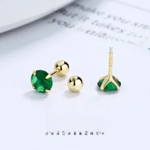 Macro shot of 925 sterling silver emerald zircon stud earring with screw back and S925 hallmark