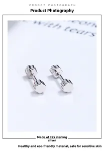 Macro shot of 925 sterling silver plum blossom stud earrings with screw back design