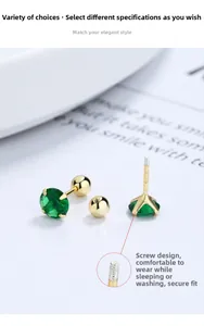 Detail view of gold-plated S925 silver stud earrings with green zircon and screw thread back
