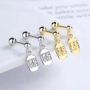 Macro view of S925 sterling silver screw back earrings with traditional Fu character plaques