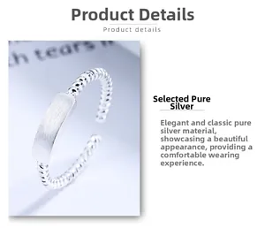 Macro detail of 925 sterling silver twisted ring with a brushed matte rectangular surface