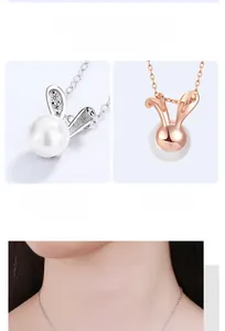 Detail of silver bunny pearl pendant with shiny crystals and rose gold variant