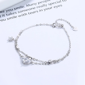 925 silver bracelet featuring moon and star charms with water-drop crystal elements