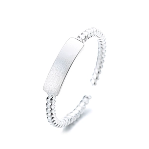 Minimalist 925 sterling silver twisted ring with a brushed rectangular plate and open design