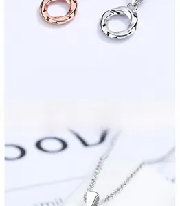 Close-up of Möbius 925 sterling silver necklace in rose gold and silver finish