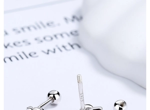 Macro shot of S925 sterling silver stud earring with threaded screw back and hallmark