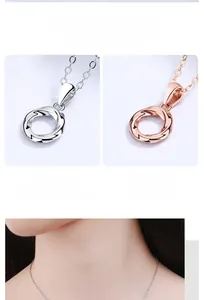 Detail of Mobius twist necklace in silver and rose gold with multi-layer plating