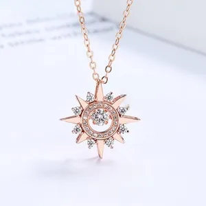 Macro detail of rose gold North Star necklace featuring a dancing zircon stone setting