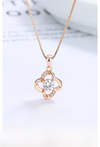 Close-up of S925 sterling silver four-leaf clover pendant with zircon in rose gold