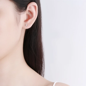 925 silver five-petal flower stud earring with zircon inlay worn by model