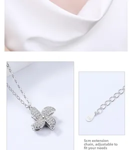 Detail of S925 sterling silver spinning clover necklace with a 5cm adjustable extension chain